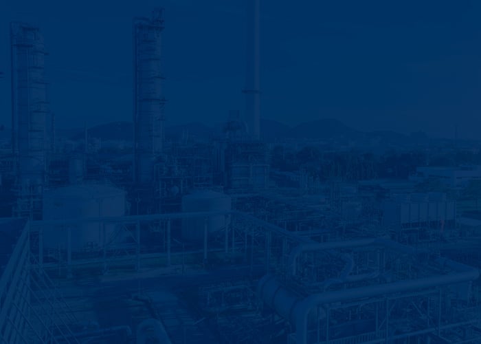 industrial plant facility with a blue overlay